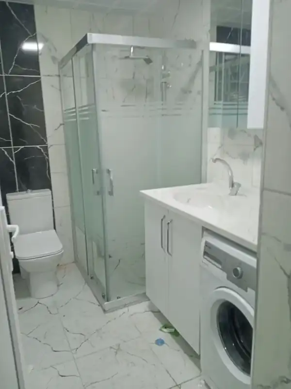 Banyo yenileme · siyah mermer detaylı
